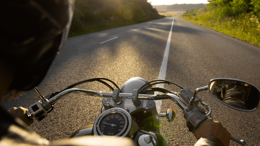 Motorcyclist lane splitting.