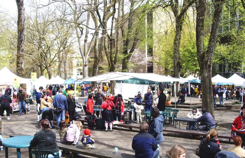 People gather for a farmers market during Autumn in Portland, Oregon.
