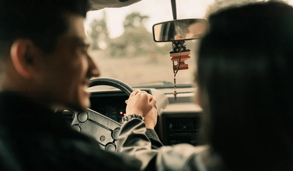 A passenger distracting the car driver.